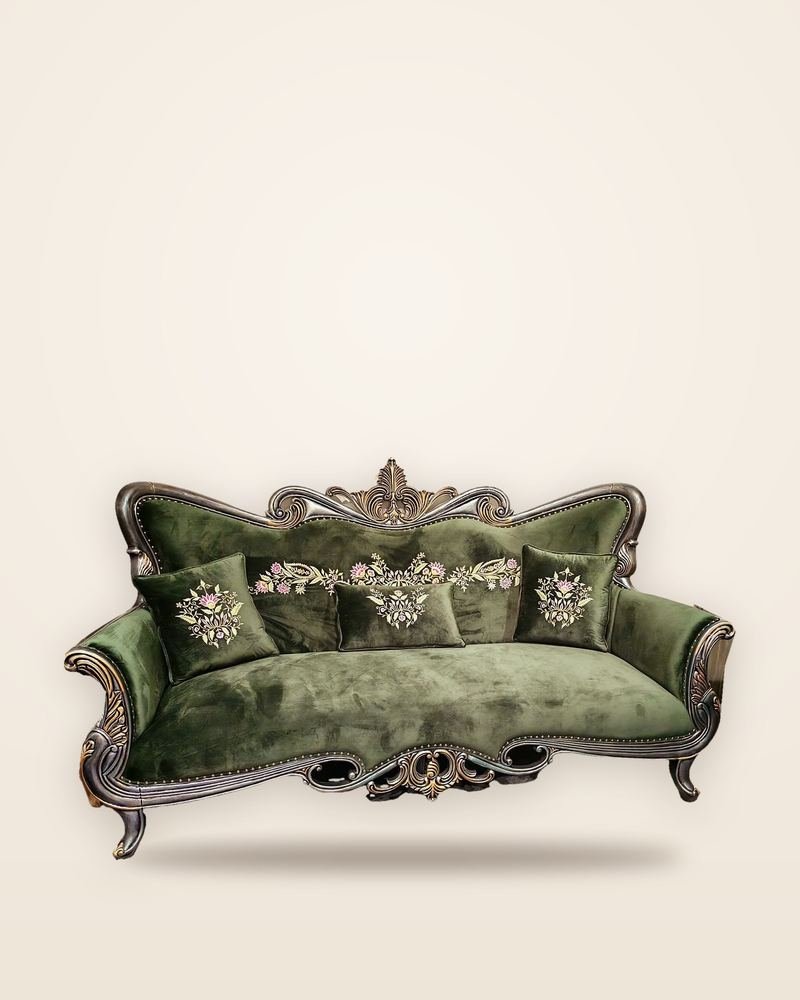 Carved wooden sofa covered in velvet