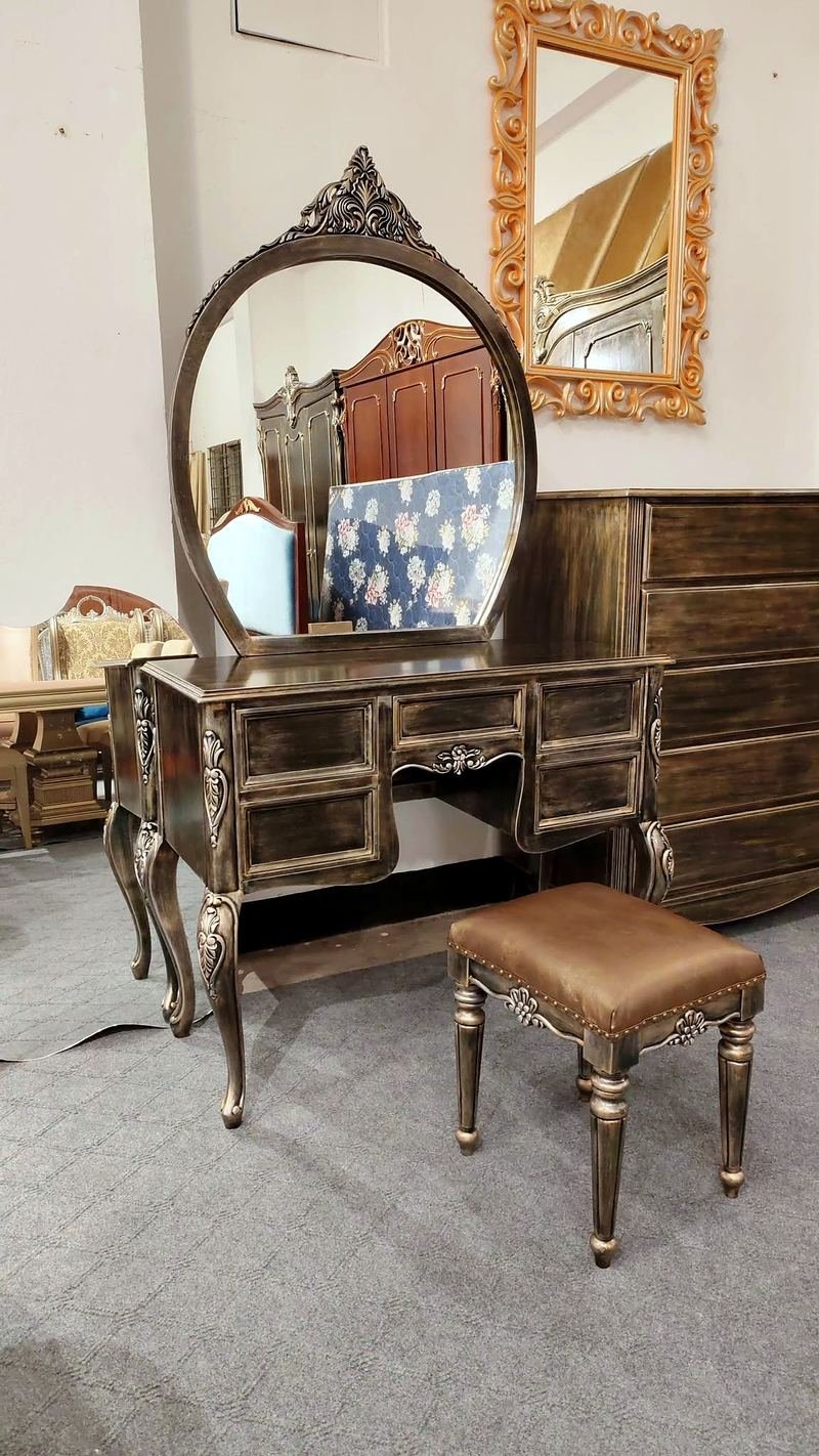 Carved dressing table with a mirror and stool