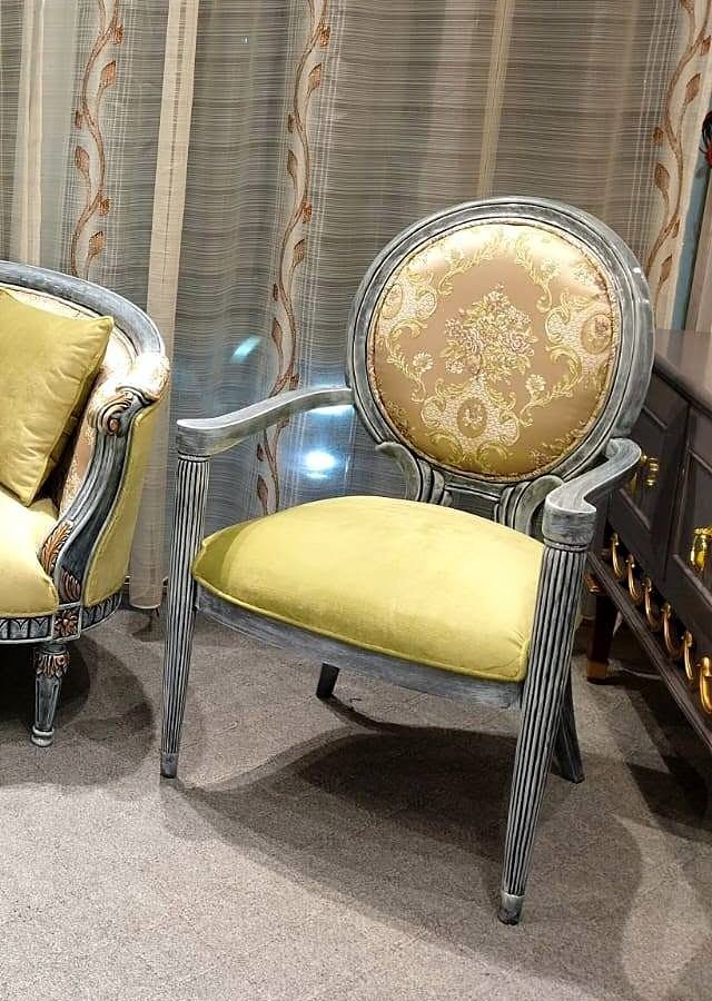 Details of an armchair with an oval-shaped back